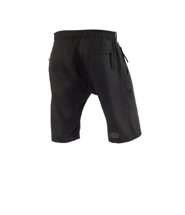 photo of black, 100% linen drop crotch shorts for men on white background.