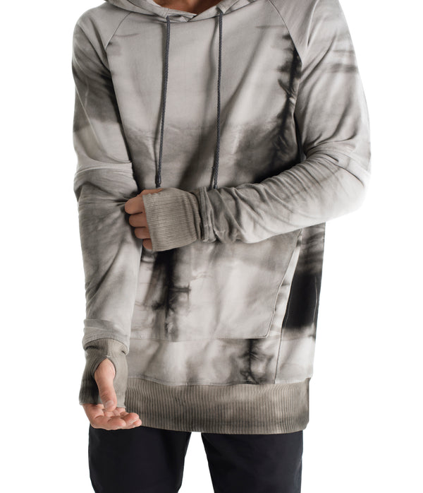 Drawstring hoodie sweatshirt crafted from medium weight cotton terry finished with ecovero* ribbing, lined hood. Hand dyed with plant with shibori method.