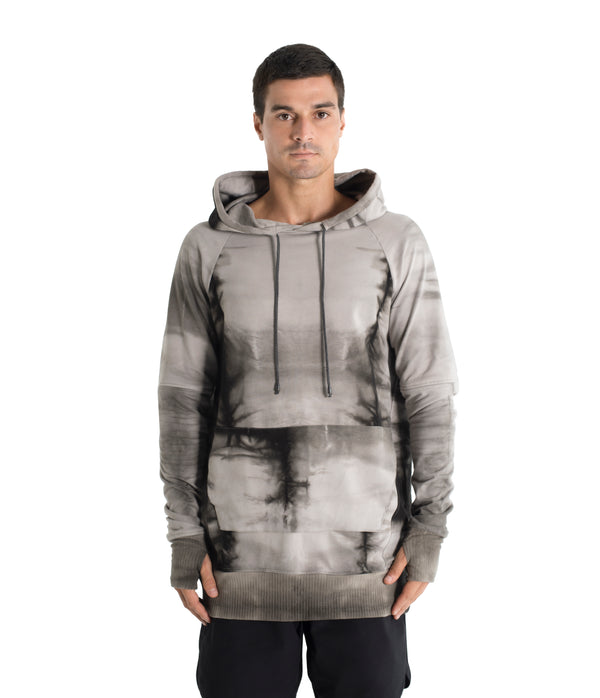 Drawstring hoodie sweatshirt crafted from medium weight cotton terry finished with ecovero* ribbing, lined hood. Hand dyed with plant with shibori method.