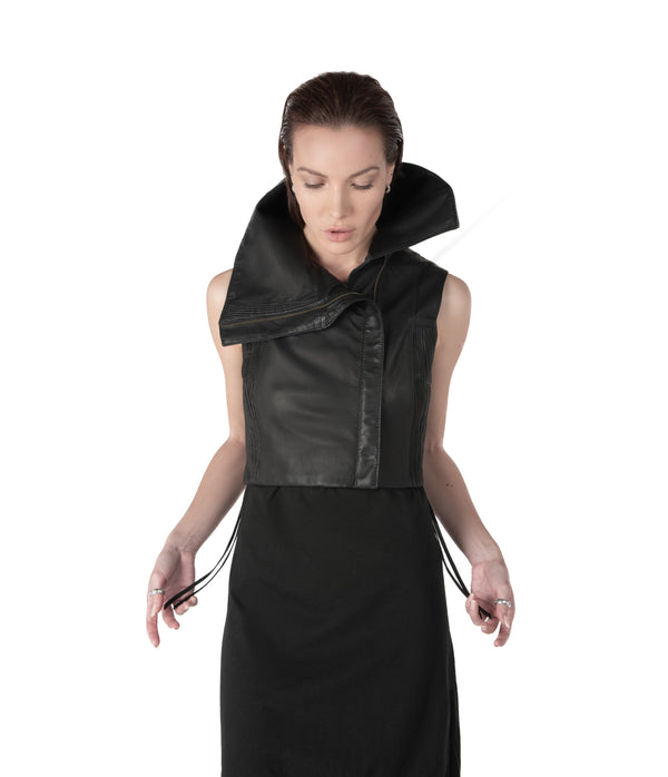 sculptural lambskin sleeveless vest with high flared collar.