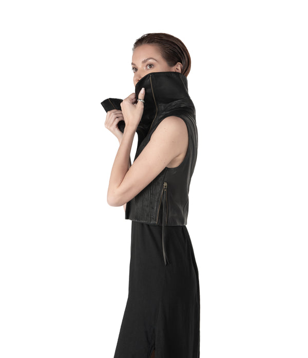 sculptural lambskin sleeveless vest with high flared collar,