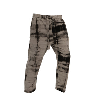 Plant dye, ankle length, unisex trousers, crafted from 100% cotton, front-tie fastening, elastic on waist and 2 front pockets.