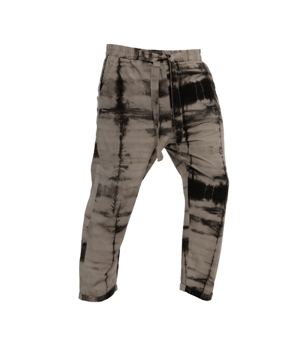 Plant dye, ankle length, unisex trousers, crafted from 100% cotton, front-tie fastening, elastic on waist and 2 front pockets.