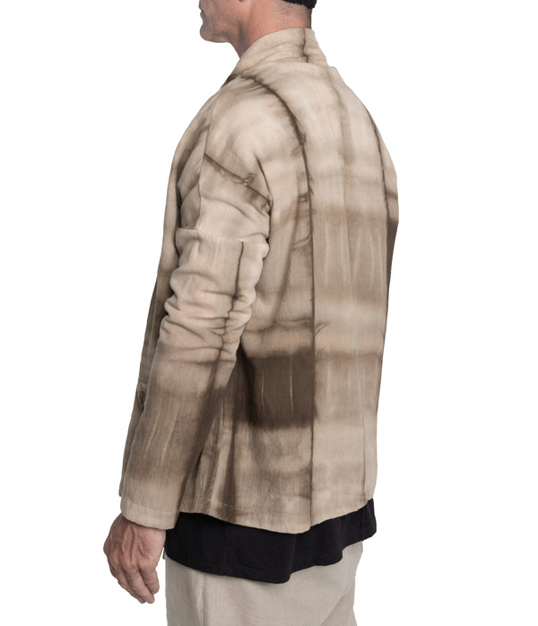 Kimono style jacket crafted from 100% plant dyed cotton, 3 front-tie fastening and 2 front pockets.