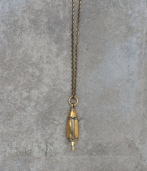 Gorgeous brass bottle pendant on matching chain.  Twists open to reveal a spike perfect for dabbing on your favorite perfume. A necklace of my design, the tear drop bottle has been hand cast. 