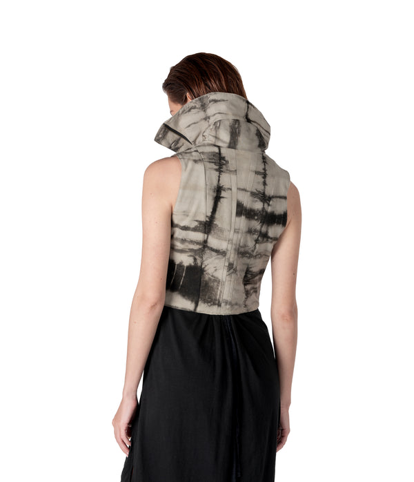 plant dyed cropped women sleeveless vest with high flared collar. Zippers along waist line. Hand cast snake claw front zipper pull.